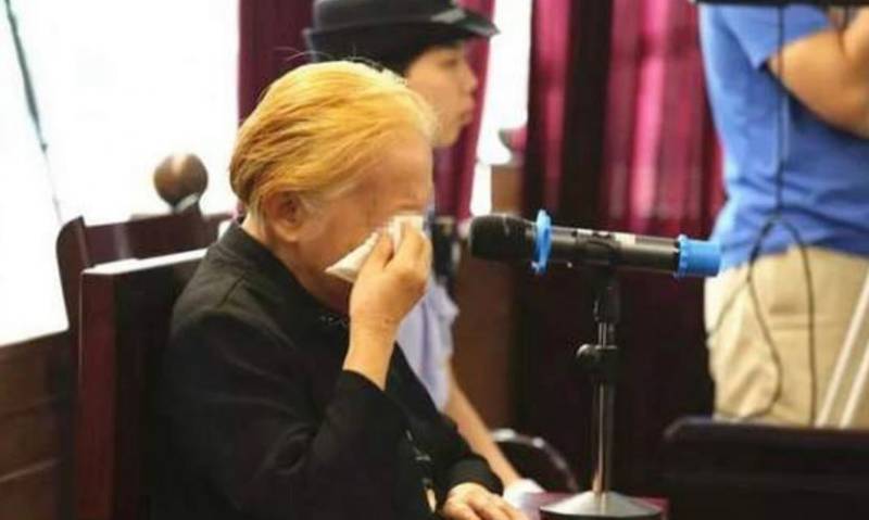 فلیٹ کو آگ لگا کر خاندان کو جلانے والی چینی خاتون عبرت کا نشان