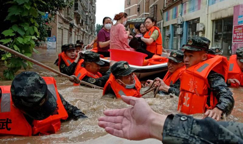 Heavy rains kill 21 in China's Hubei province, red alert issued