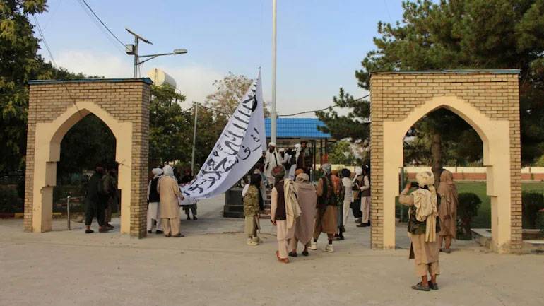The Taliban announced the end of the war and waved their flag at the presidential palace