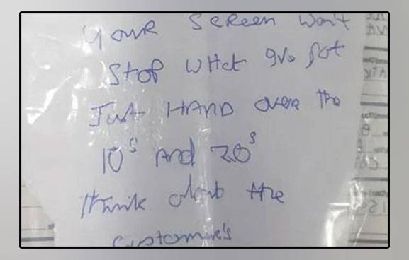Extremely dirty handwriting, staff could not read the threatening message, bank robbery failed