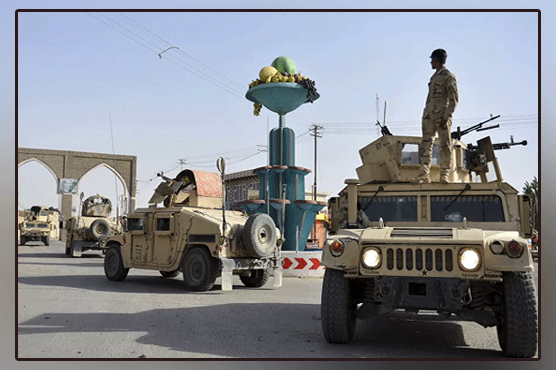 A bomb blast near military base in Ghazni has killed at least 21 people and injured dozens