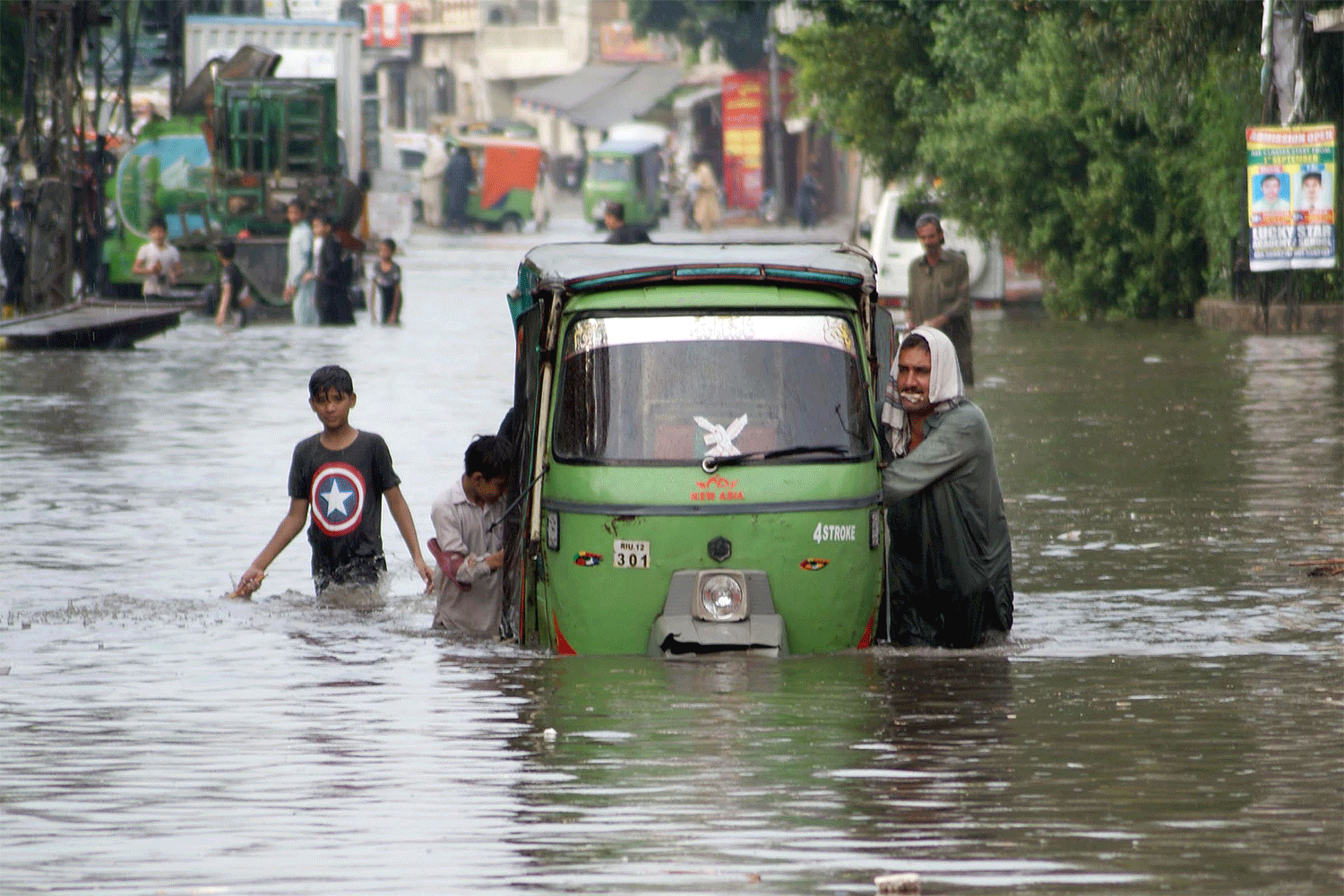 Heavy rains in Karachi flooded the entire city, killing a mother and three children when a roof collapsed